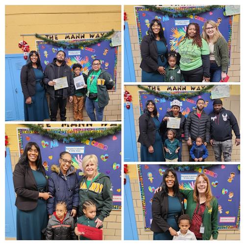 Students pose with Principal, their teacher and families with an award